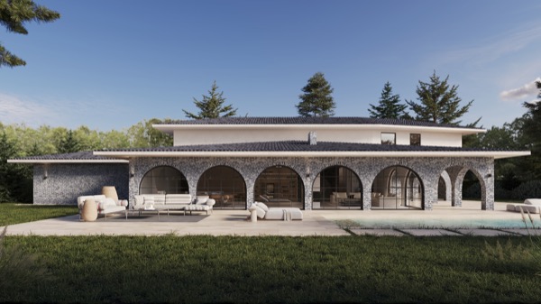 Mediterrane Villa mit Natursteinfassade, Rundbogenfenstern, Ziegeldach, Terrasse mit Loungemöbeln und Pool im Garten