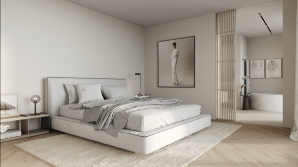Minimalistisches Schlafzimmer in Weiss und Beige mit Polsterbett, hellem Parkett und Blick ins Marmorbad
